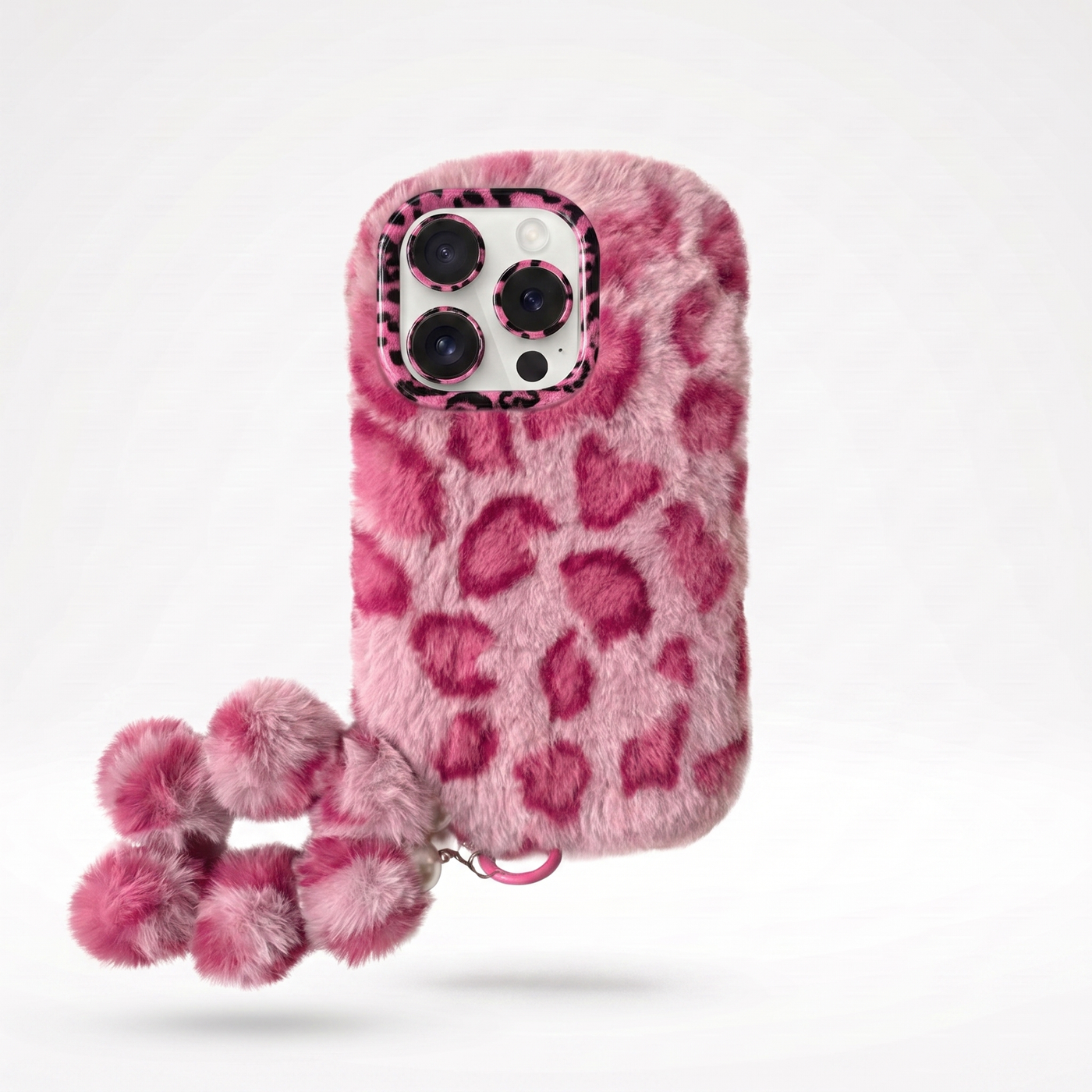 KASED Fuzzy Flirt phone case – pink furry leopard plush design with wrist chain for iPhone, playful aesthetic