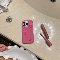 KASED Petal Pop iPhone case – bright floral print, shown on iPhone