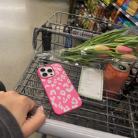 KASED Cherry Leopard iPhone case – rose-red leopard print, shown on iPhone