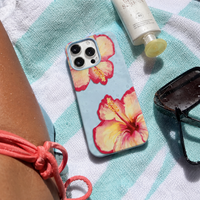 KASED Sky Bloom iPhone case – sky-blue floral print, shown on iPhone