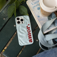 KASED Aquatic Choice iPhone case – aqua amor heart print, shown on iPhone