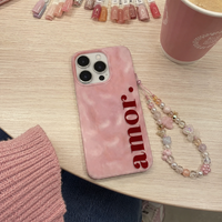 KASED Cotton Candy iPhone case – pink amor heart print, shown on iPhone