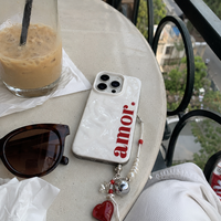 KASED Crema Love iPhone case – cream amor heart print, shown on iPhone