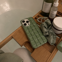 KASED Matcha Weave iPhone case – 3D cube weave texture, shown on iPhone