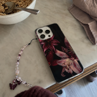 KASED Scarlet Lily iPhone case – red lily floral print, close-up detail