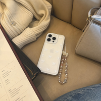 KASED Coquette Bow iPhone case – clear bow design, close-up detail
