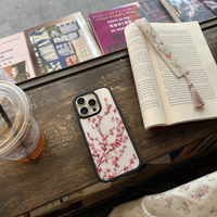 KASED Sakura Blush iPhone case – blush cherry-blossom print, close-up detail
