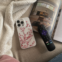 KASED Sakura Dream iPhone case – cherry-blossom print, shown on iPhone