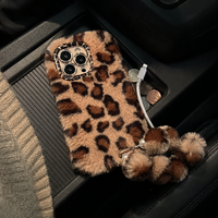 KASED Golden Jungle iPhone case – furry leopard plush, detail view